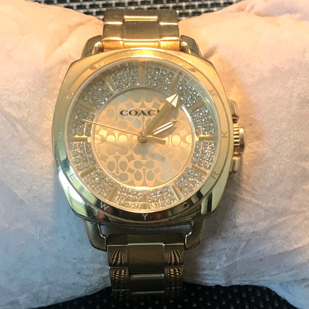 Gold coach watch